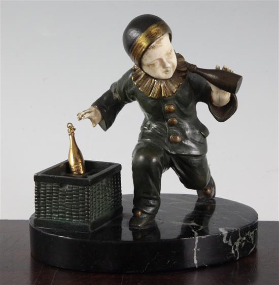 O. Gerard. An early 20th century bronze and ivory figure of a child pierrot, height overall 5.75in.